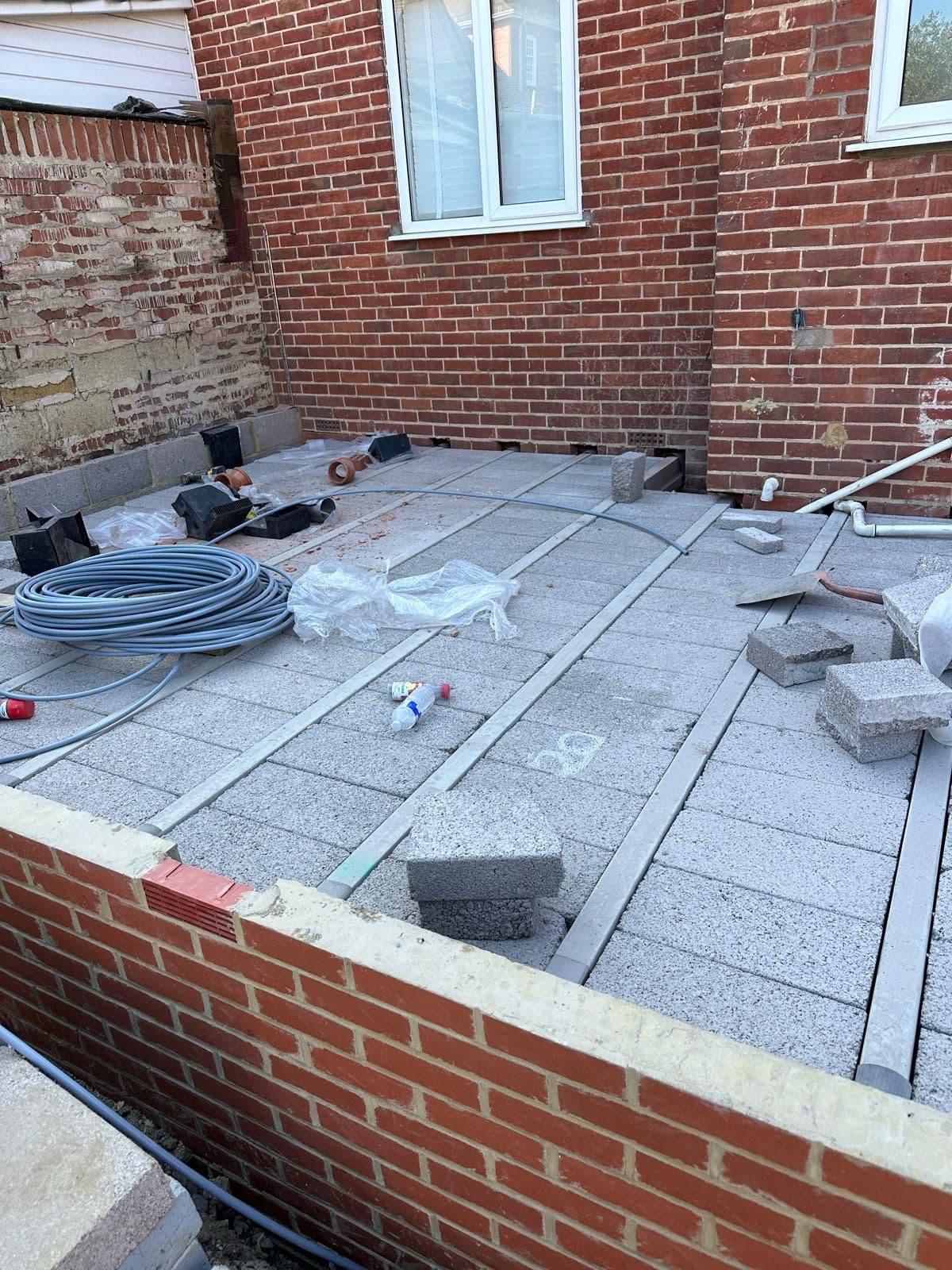 Bathroom vanity unit with basin and wall-mounted fixtures