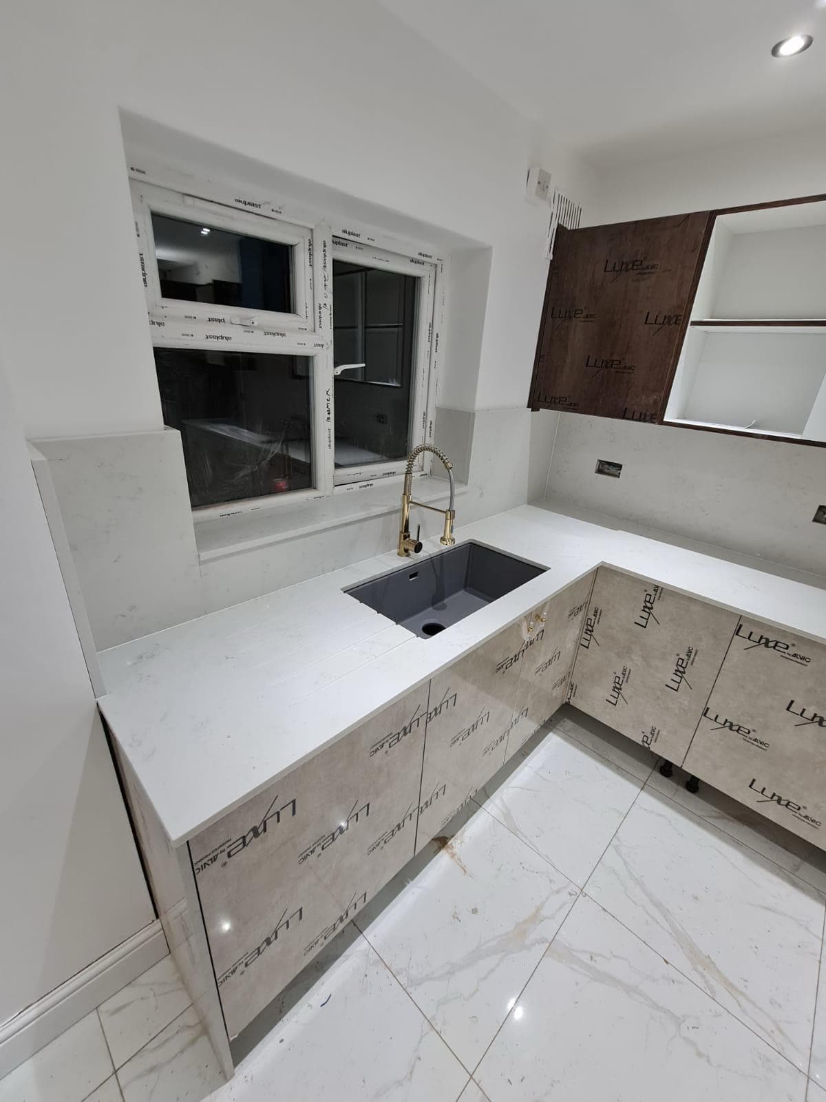 Kitchen renovation with marble countertops in Edgware