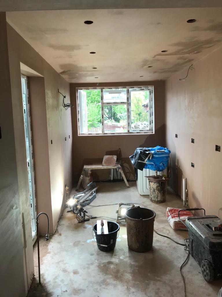 Extension brickwork with window frames fitted