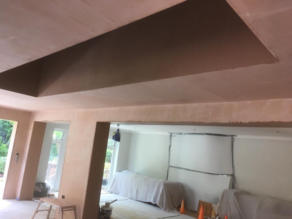 Plastered living room with skylight